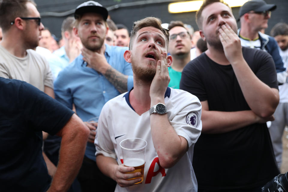 Tottenham Hotspur in The White Hart Lane pub in London react to the early Liverpool goal during the UEFA Champions League final between Tottenham and Liverpool, at the Wanda Metropolitan Stadium in Madrid, Spain on Saturday night.