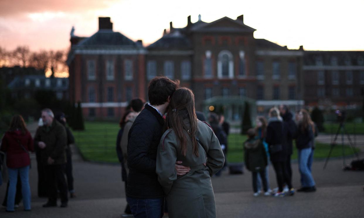 <span>Well-wishers outside Kensington Palace in London after Catherine announced she was being treated for cancer.</span><span>Photograph: Henry Nicholls/AFP/Getty Images</span>