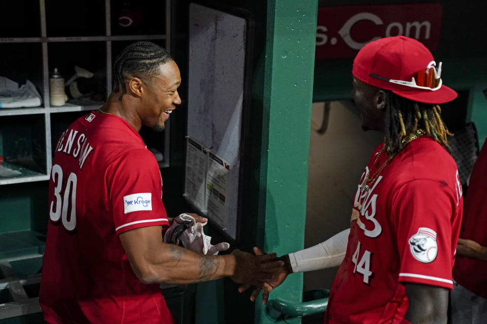 Cincinnati Reds' Will Benson (30) celebrates with Elly De La Cruz (44) after hitting a walk-off, two-run home run against the Los Angeles Dodgers in the ninth inning of a baseball game in Cincinnati, Wednesday, June 7, 2023. This was Benson's first major league home run (AP Photo/Jeff Dean)