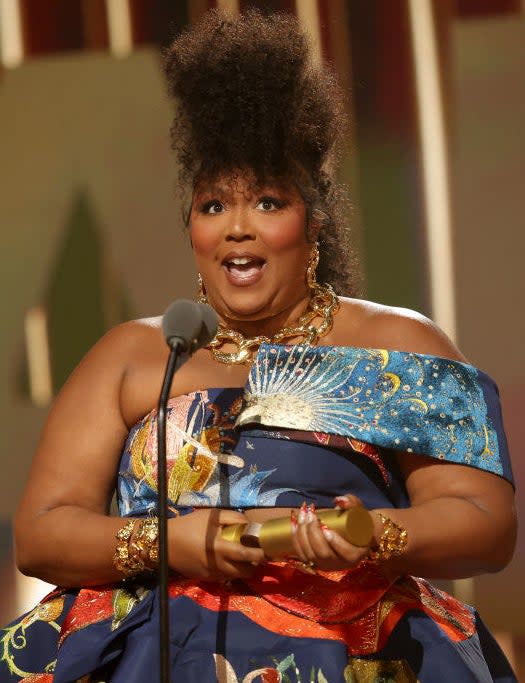 Lizzo accepts The People's Champion award