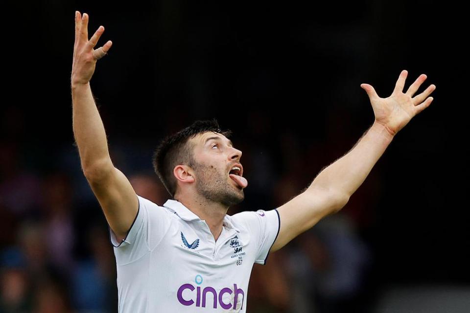 Mark Wood celebrates the wicket of Mitchell Starc in the final Test.