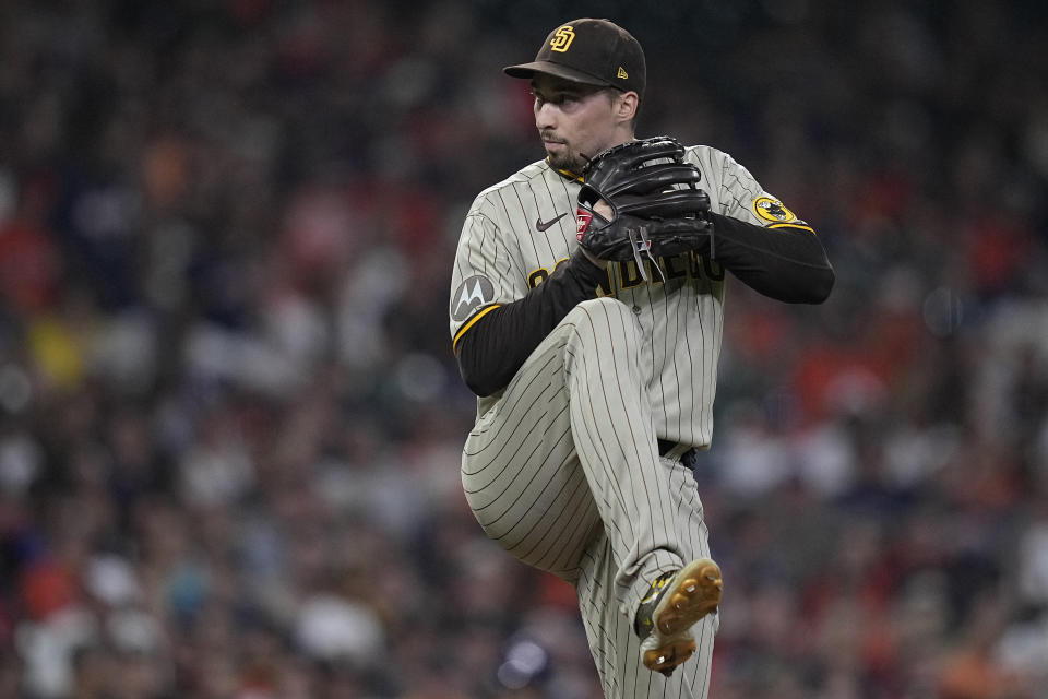 San Diego Padres starting pitcher Blake Snell winds up during the first inning of the team's baseball game against the Houston Astros, Friday, Sept. 8, 2023, in Houston. (AP Photo/Kevin M. Cox)