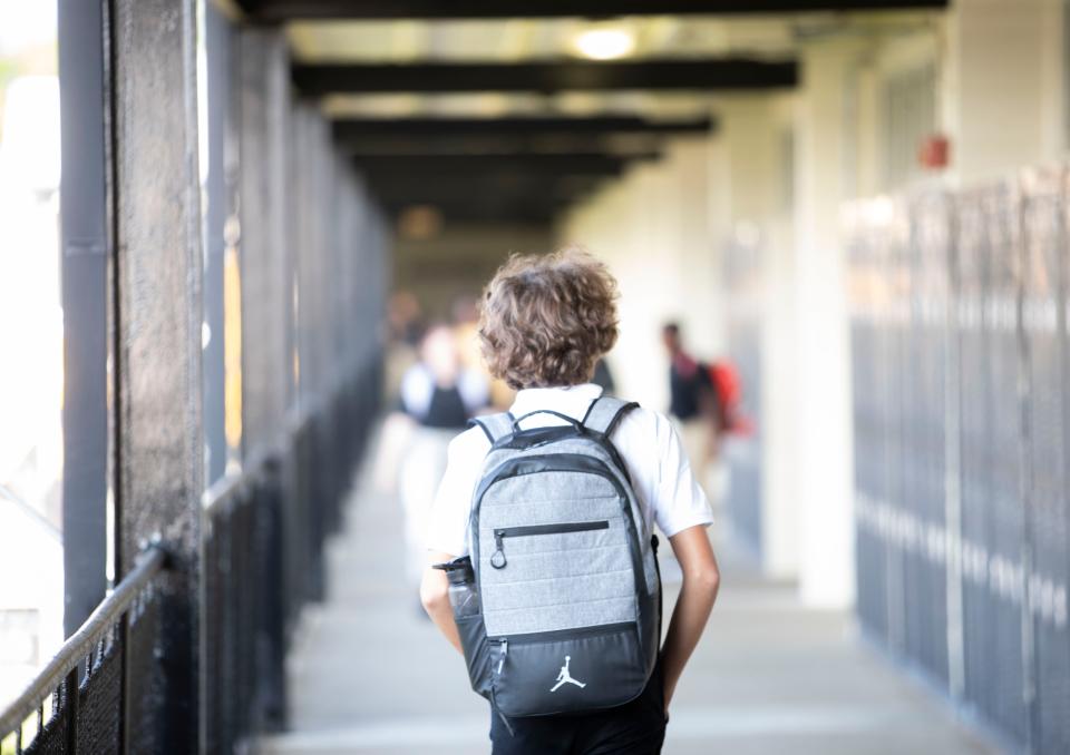 Nims Middle School students head to class on the first day of school Monday, August 12 2024.