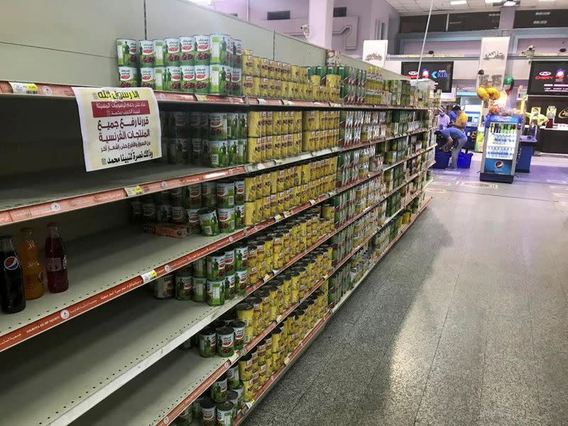 Empty shelves are seen where French products were displayed, after Kuwaiti supermarkets' boycott on French goods, in Kuwait City