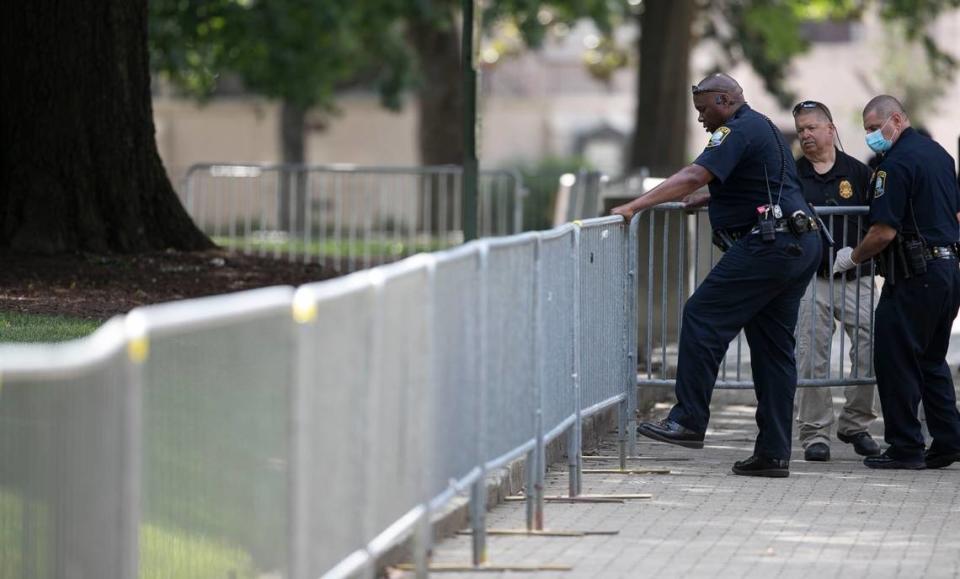 The North Carolina State Capital Police install bicycle barriers around the perimeter of the State Capitol Building on Friday, June 12, 2020 in Raleigh, N.C.