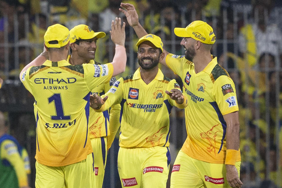 Chennai Super Kings' players celebrate the wicket of Royal Challengers Bengaluru's Virat Kohli during the Indian Premier League cricket tournament match between Chennai Super Kings and Royal Challengers Bengaluru in Chennai, India, Friday, March 22, 2024. (AP Photo/R. Parthibhan)