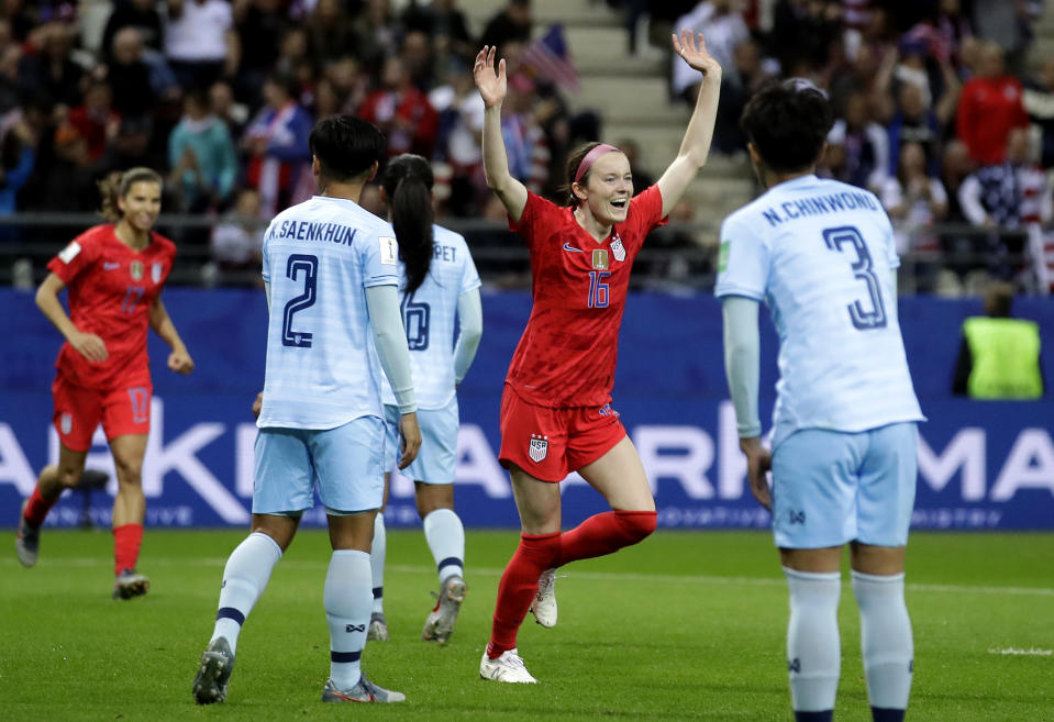 FILE - United States' Rose Lavelle, 2nd right, celebrates after scoring her side's 7th goal during the Women's World Cup Group F soccer match between United States and Thailand at the Stade Auguste-Delaune in Reims, France, June 11, 2019. The Thailand women's soccer team endured the biggest-ever loss at a women's soccer World Cup, in June 2019, a 13-0 trouncing by the United States which cast an unwelcome spotlight on the state of the sport in the South East Asian nation. Now a refurbished Thailand team under a new head coach and with the youngest playing group in its history has played Cameroon in an inter-continental playoff match in New Zealand, hoping to qualify again for a World Cup and move beyond the shadow of that defeat. (AP Photo/Alessandra Tarantino,File)