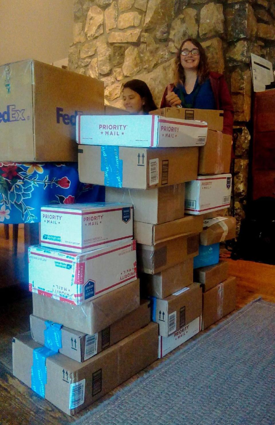 This undated photo provided by Four Winds * Westward Ho Camps shows care packages stacked up at the camp on a particularly busy care package day at Four Winds * Westward Ho Camps on Orcas Island, Wash. (Abigail Bernard/Four Winds * Westward Ho Camps via AP)