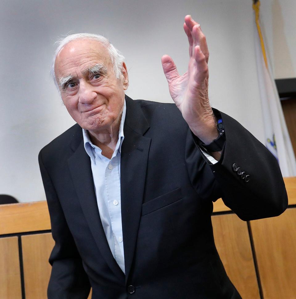 Frank Bellotti, the courthouse's name sake, waves at the guests who came to Quincy District Court to celebrate his 100th birthday Wednesday, May 3, 2023.