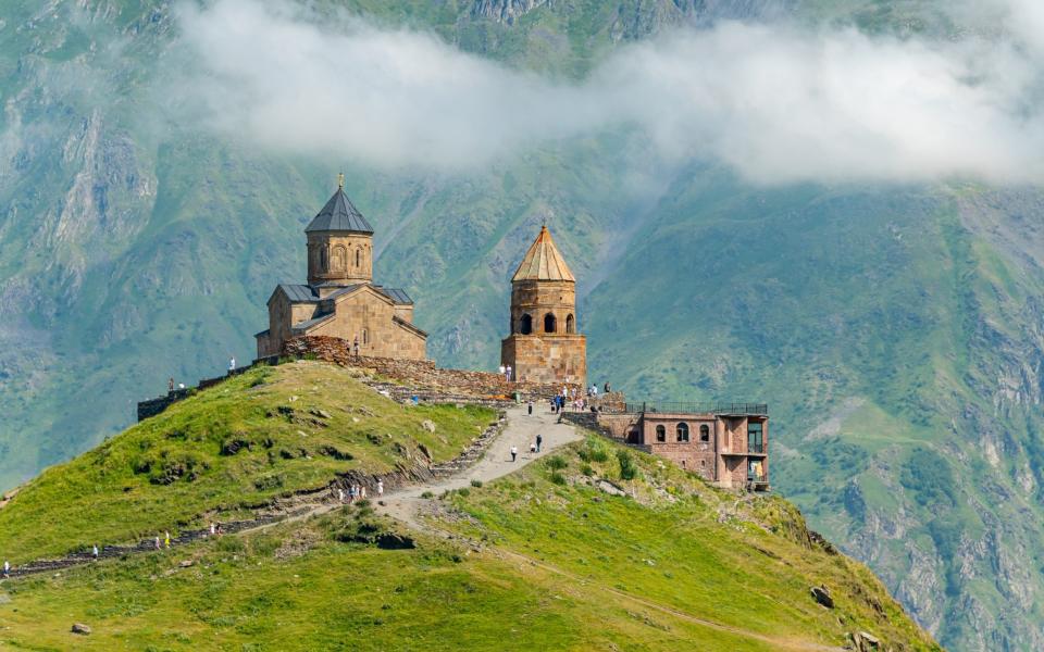 Georgia, Kazbegi. Gergeti's church in Stepantsminda. Caucasus - Stefan Cristian Cioata/Getty Images