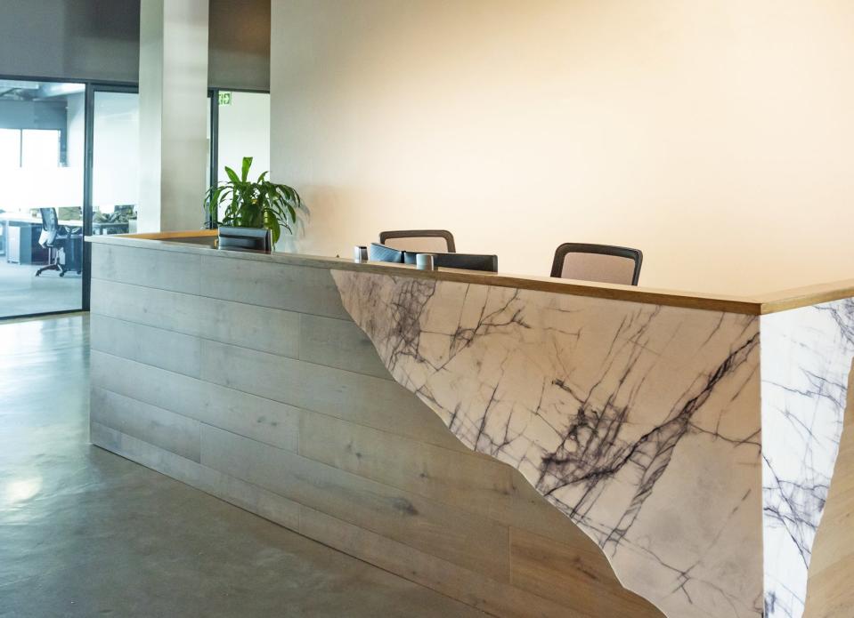 a reception desk in a lobby