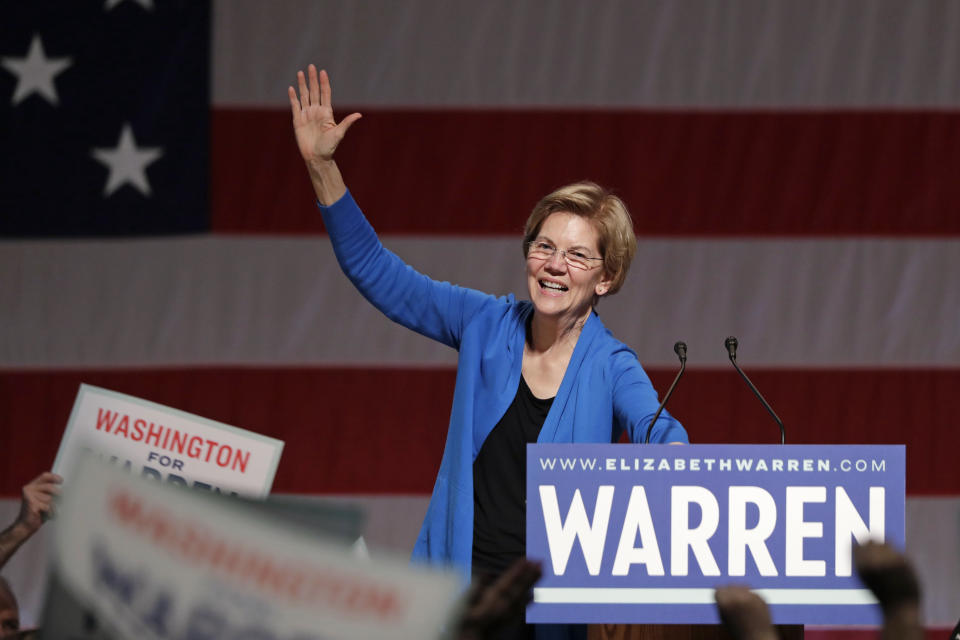 Democratic presidential candidate U.S. Sen. Elizabeth Warren, D-Mass., waves as she finishes speaking during a campaign event Saturday, Feb. 22, 2020, in Seattle. (AP Photo/Elaine Thompson)