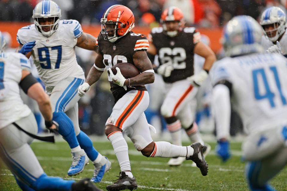 Cleveland Browns wide receiver Jarvis Landry (80) scrambles for a 16-yard touchdown during the first half of an NFL football game against the Detroit Lions, Sunday, Nov. 21, 2021, in Cleveland. (AP Photo/Ron Schwane)