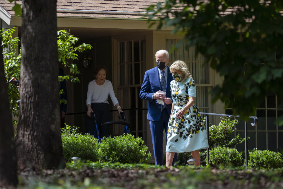 Former first lady Rosalynn Carter looks on as President Joe Biden and first lady Jill Biden leave the home of former President Jimmy Carter during a trip to mark Biden’s 100th day in office, Thursday, April 29, 2021, in Plains, Ga. (AP Photo/Evan Vucci)