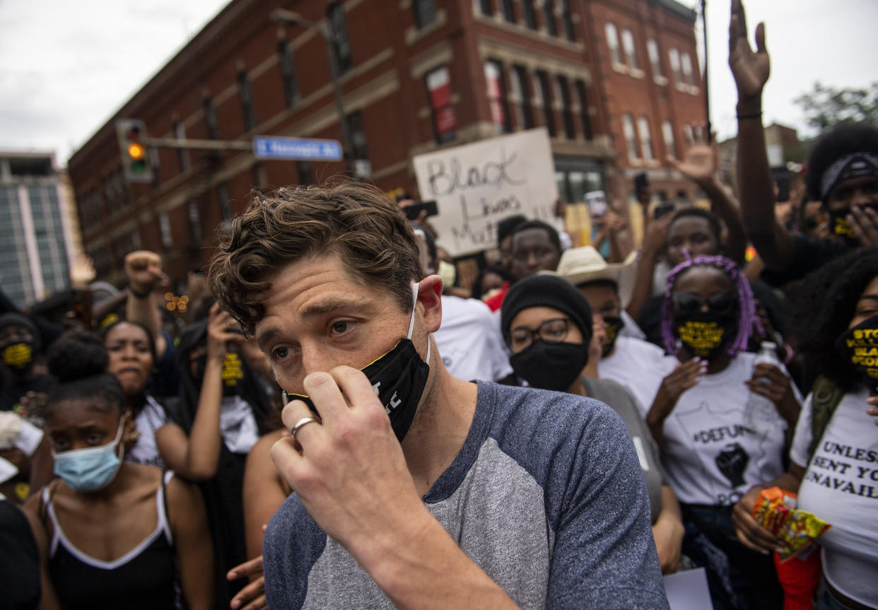 Minneapolis Mayor Jacob Frey leaves after declining to say he would fully defund the police at a protest on Saturday. (Photo: Stephen Maturen via Getty Images)
