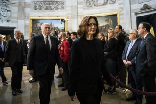 CIA Director Gina Haspel paid her respects at the casket of former president George H.W. Bush as he lay in state at the US Capitol, before she briefed US senators on Saudi Arabia's possible involvement in the murder of journalist Jamal Khashoggi