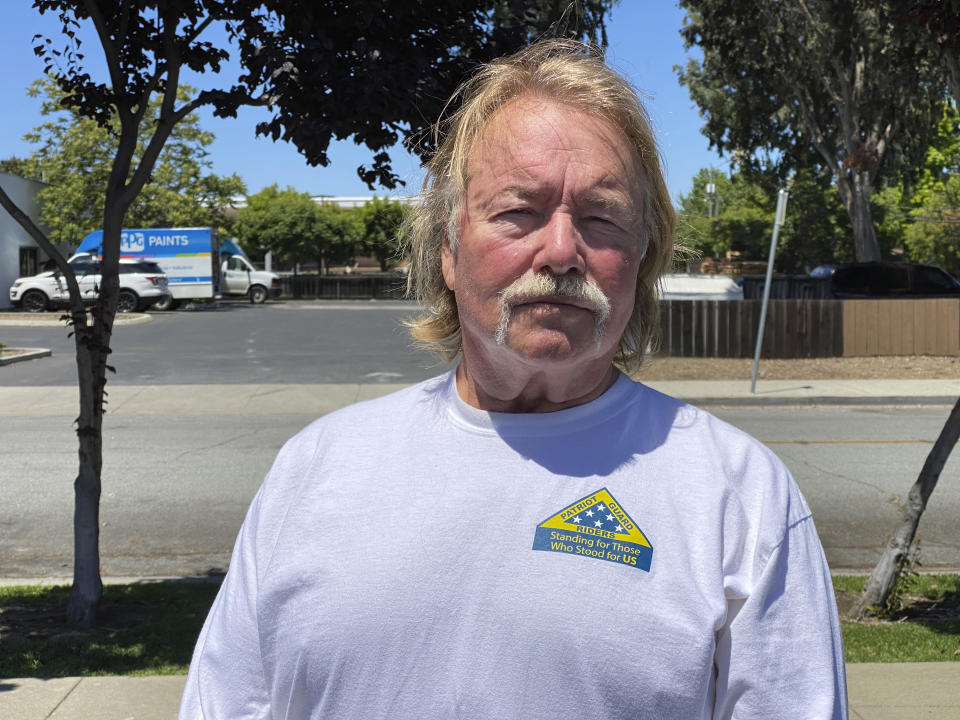 Kirk Bertolet, a train signal maintenance worker at Valley Transportation Authority, talks about Wednesday's shooting in San Jose, Calif., on Thursday May 27, 2021. Bertolet was at work Wednesday morning when a gunman fatally shot nine of his co-workers before killing himself. Bertolet said he was next door to the room where several of his colleagues were gunned down. After the gunman left, he tried to help his colleagues, but it was too late. (AP Photo/Terry Chea)