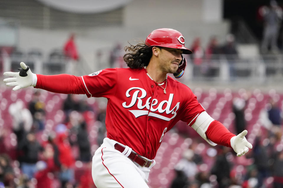 Cincinnati Reds' Jonathan India reacts after hitting a solo home run during the first inning of a baseball game against the Pittsburgh Pirates, Saturday, April 1, 2023, in Cincinnati. (AP Photo/Joshua A. Bickel)