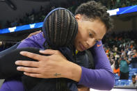 FILE - Phoenix Mercury center Brittney Griner, right, hugs former college teammate Dallas Wings guard Odyssey Sims after a WNBA basketball basketball game in Arlington, Texas, Friday, June 9, 2023. Griner says since her release from a Russian prison 17 months ago that she has used her platform as a WNBA All-Star and Olympic gold medalist to advocate for the return of other Americans detained overseas. (AP Photo/LM Otero, File)