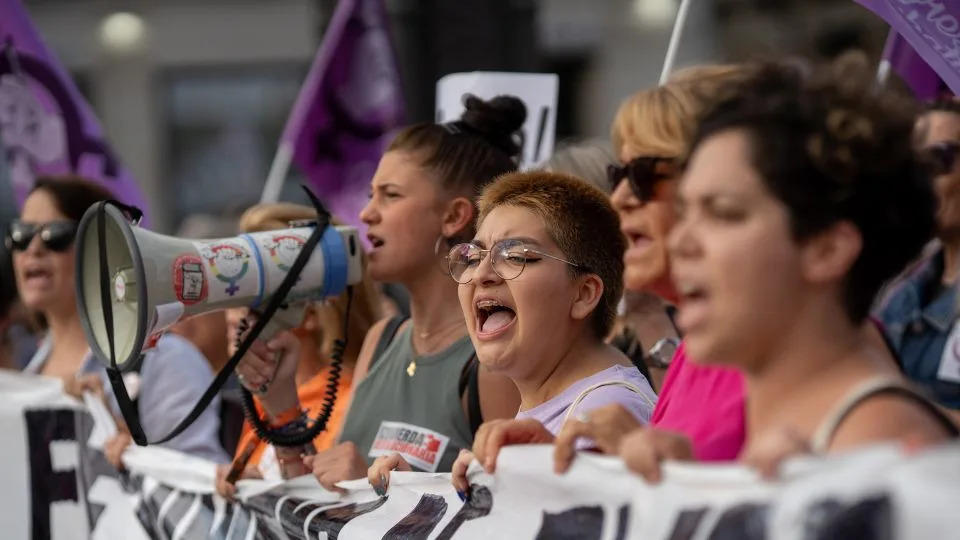 People are seen participating in a protest against Rubiales in Madrid, Spain, on Friday. - Manaure Quintero/Bloomberg/Getty Images