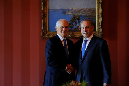 Israeli Prime Minister Benjamin Netanyahu (R) and Australian Prime Minister Malcolm Turnbull shake hands before their bilateral meeting at Admiralty House in Sydney, Australia, February 22, 2017. REUTERS/Jason Reed