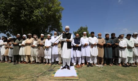 Siraj ul Haq, head of Pakistan's political and religious party Jama'at e Islami, leads the funeral prayers in absentia for the former Egyptian President Mohamed Mursi, in Peshawar