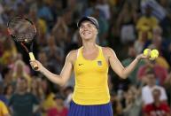 Elina Svitolina of Ukraine celebrates after winning her match against Serena Williams. REUTERS/Kevin Lamarque