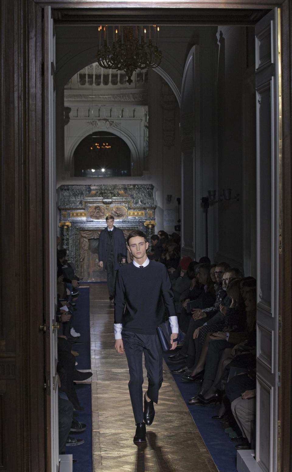 Models wear creations by fashion designers Maria Grazia Chiuri and Pier Paolo Piccioli for Valentino, as part of their presentation for the men's Spring Summer 2013 Haute Couture fashion collection presented in Paris, Wednesday, Jan. 16 2013. (AP Photo/ Jacques Brinon)