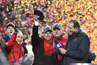 Norma Hunt, left, and her son Clark Hunt, center, owners of the Kansas City Chiefs, and Kansas City Chiefs head coach Andy Reid, second right, celebrate after the NFL AFC Championship football game against the Tennessee Titans Sunday, Jan. 19, 2020, in Kansas City, MO. The Chiefs won 35-24 to advance to Super Bowl 54. (AP Photo/Jeff Roberson)