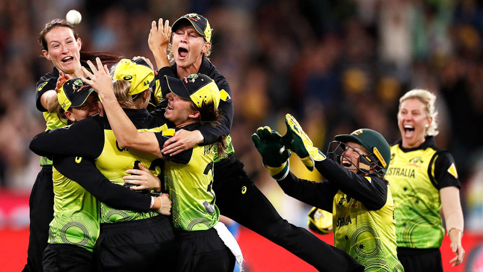 Pictured here, Australia celebrates its fifth Women's T20 World Cup final victory.