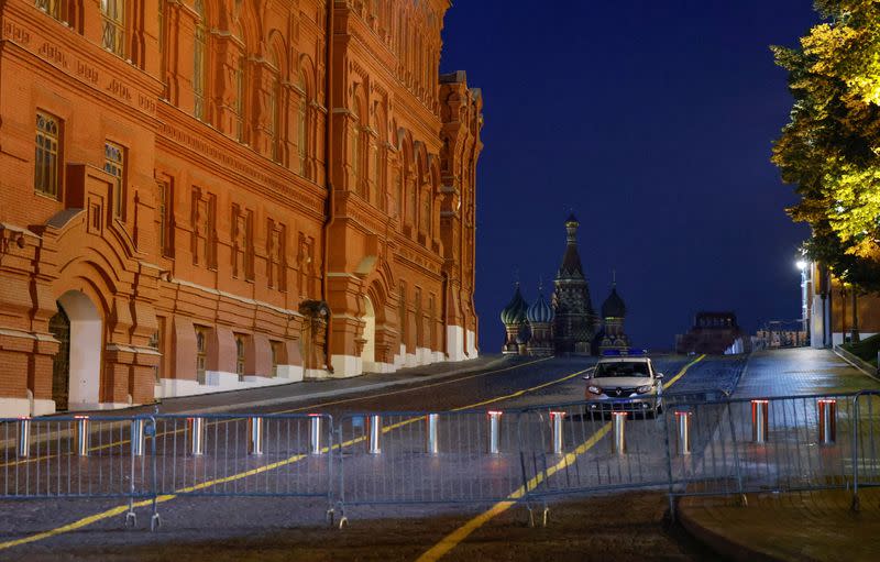 A police car is seen behind a barrier on the Red Square in central Moscow