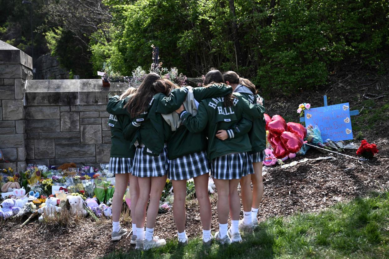 March 28, 2023: Girls embrace in front of a makeshift memorial for victims by the Covenant School building at the Covenant Presbyterian Church following a shooting, in Nashville, Tennessee. - A heavily armed former student killed three young children and three staff in what appeared to be a carefully planned attack at a private elementary school in Nashville on Monday, before being shot dead by police.

Chief of Police John Drake named the suspect as Audrey Hale, 28, who the officer later said identified as transgender.