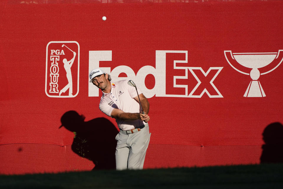 Max Homa hits the ball up to the 18th green of the Silverado Resort North Course during the final round of the Fortinet Championship PGA golf tournament Sunday, Sept. 19, 2021, in Napa, Calif. Homa won the tournament. (AP Photo/Eric Risberg)