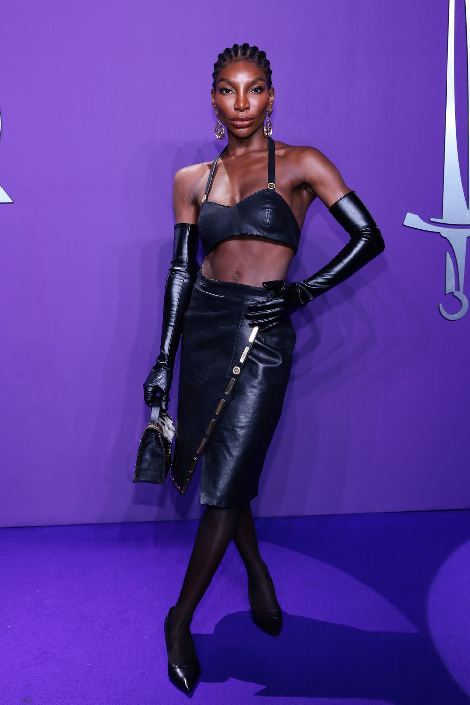 michaela coel in a leather bra top and midi skirt at the 2024 gq creativity awards