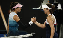 Tennis - Australian Open - Second Round - Melbourne Park, Melbourne, Australia, January 18, 2019. Spain's Garbine Muguruza and Britain's Johanna Konta shake hands after the match. REUTERS/Edgar Su