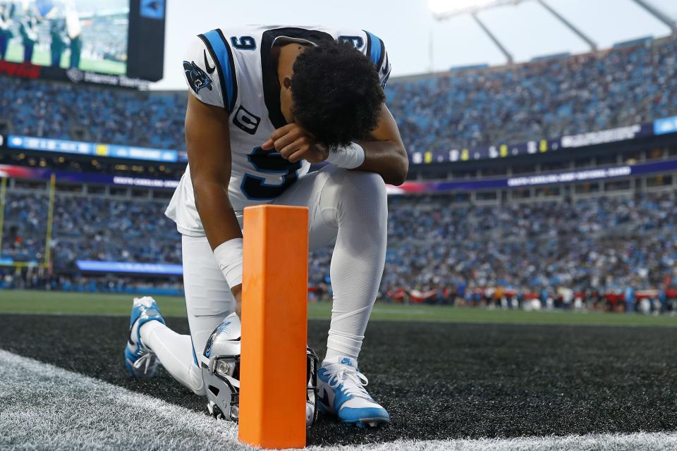 CHARLOTTE, NORTH CAROLINA - SEPTEMBER 18: Bryce Young #9 of the Carolina Panthers kneels in the end zone prior to the game against the New Orleans Saints at Bank of America Stadium on September 18, 2023 in Charlotte, North Carolina. (Photo by Jared C. Tilton/Getty Images)