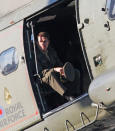 Tom Cruise is sighted flying in a helicopter on set for the movie 'All You Need Is Kill' being filmed in Trafalgar Square on November 25, 2012 in London, England.