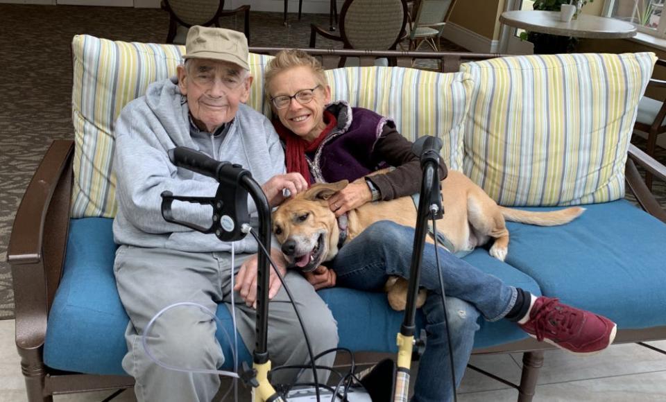 Irv Shaw Jr. is pictured with his daughter, Alix Shaw, and her dog, Benji. Shaw worked in the Lenawee County Prosecutor's Office from 1961-2020, including as prosecutor from 1991-2008. He died Dec. 23 at the age of 91.