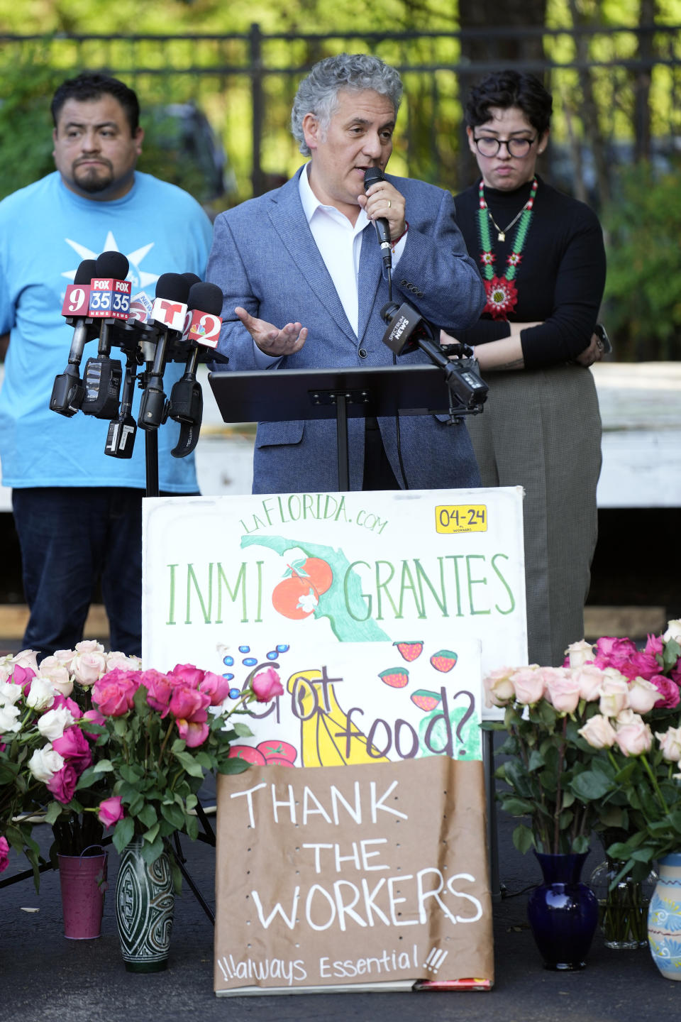 Juan Sabines, consul of Mexico in Orlando, speaks to mourners during a vigil at The Farmworkers Association Wednesday, May 15, 2024, in Apopka, Fla. Eight farmworkers from Mexico were killed and dozens more were injured when a pickup truck and bus collided early Tuesday morning in Dunnellon, Fla. (AP Photo/Chris O'Meara)