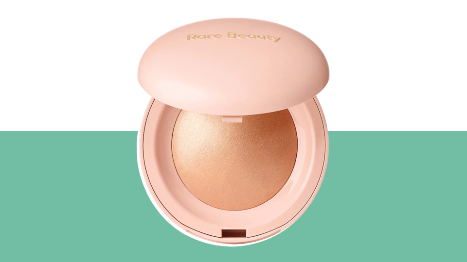Enhance your cheeks, nose and cupid's bow with a dusting of the Rare Beauty Positive Light Silky Touch Highlighter.