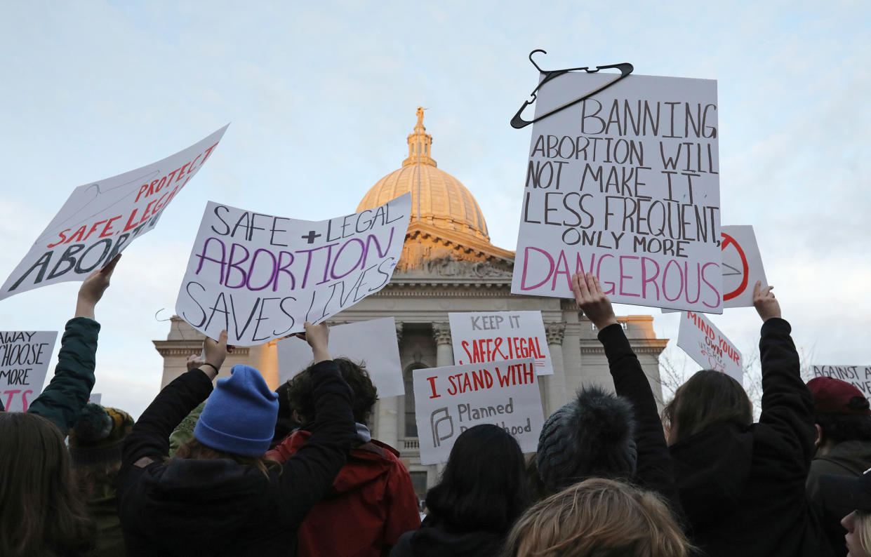 Demonstrators protest outside the state Capitol in Madison, Wis., on May 3, 2022.