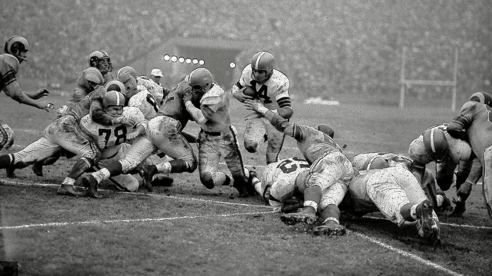 Mandatory Credit: Photo by Uncredited/AP/Shutterstock (10441630a)Cleveland Browns' quarterback Otto Graham goes over from the one yard line to score against the Los Angeles Rams in the NFL championship game, in Los Angeles.