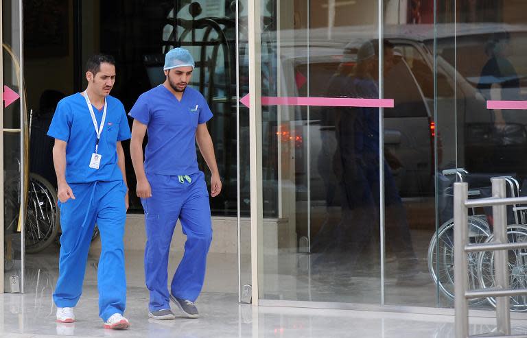 Saudi medical staff leave the emergency department at a hospital in the Saudi capital Riyadh, on April 8, 2014