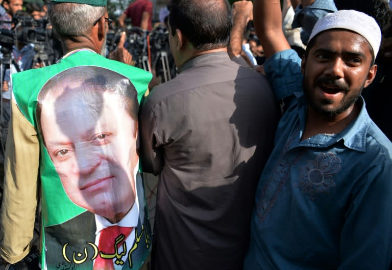 A Pakistani supporter of ousted prime minister Nawaz Sharif shouts slogans outside the high court in Islamabad