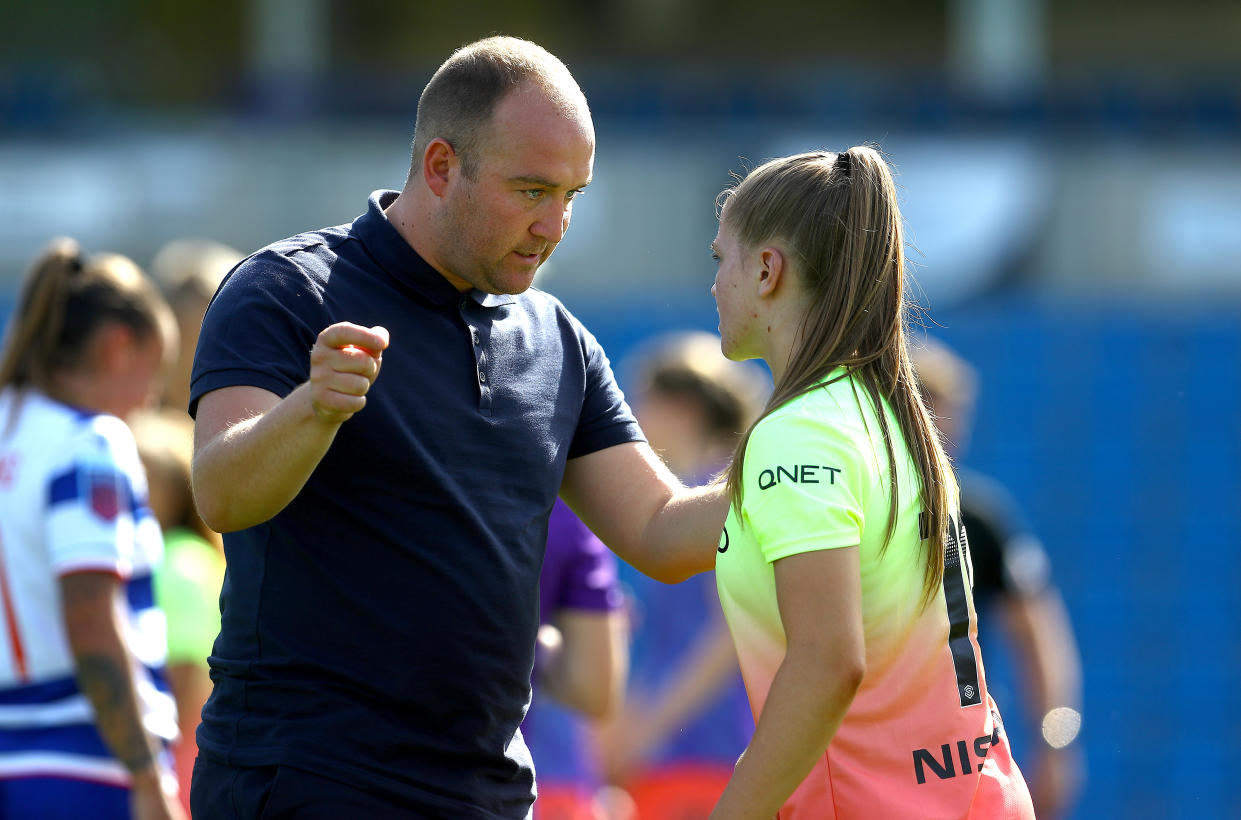 Nick Cushing talks with Manchester City's Jess Park at full time  