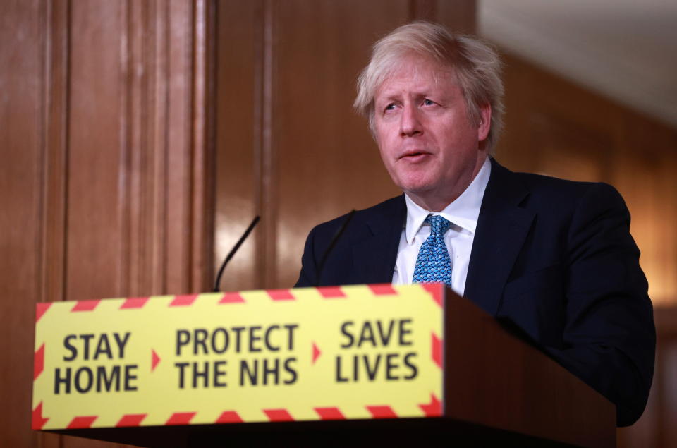 Britain's Prime Minister Boris Johnson takes part in a virtual press conference inside 10 Downing Street in central London following the introduction of a nationwide coronavirus lockdown on January 5, 2021. - Britain toughened its coronavirus restrictions on Tuesday, with England and Scotland going into another full lockdown, as a new variant spreads. (Photo by HANNAH MCKAY / POOL / AFP) (Photo by HANNAH MCKAY/POOL/AFP via Getty Images)