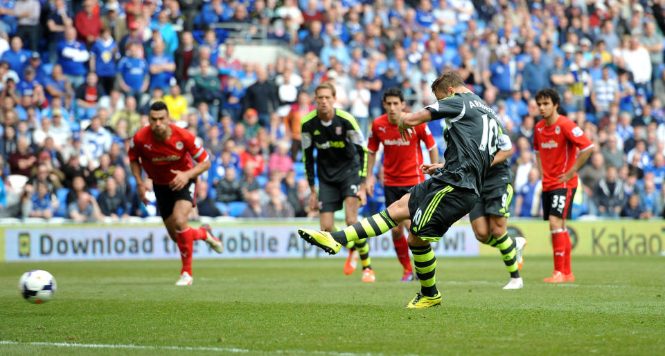 Stoke City's Marko Arnautovic scores his side's first goal of the game from the penalty spot during their English Premier League soccer match against Cardiff City at the Cardiff City Stadium, Cardiff, Wales, Saturday, April 19, 2014. (AP Photo/Andrew Matthews, PA Wire) UNITED KINGDOM OUT - NO SALES - NO ARCHIVES