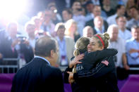 LONDON, ENGLAND - AUGUST 08: Silver medallists Jennifer Kessy and April Ross of the United States celebrate on the podium during the medal ceremony for the Women's Beach Volleyball on Day 12 of the London 2012 Olympic Games at the Horse Guard's Parade on August 8, 2012 in London, England. (Photo by Cameron Spencer/Getty Images)