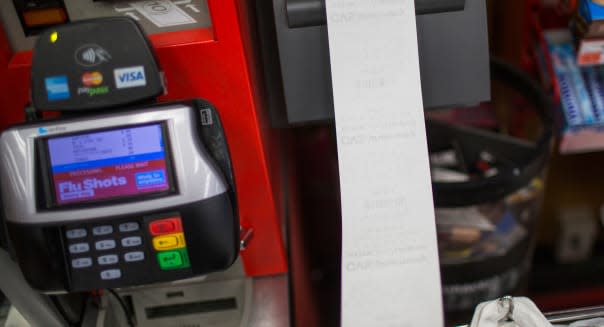 A long receipt exits a self service register at a CVS Pharmacy store in Brooklyn, New York.