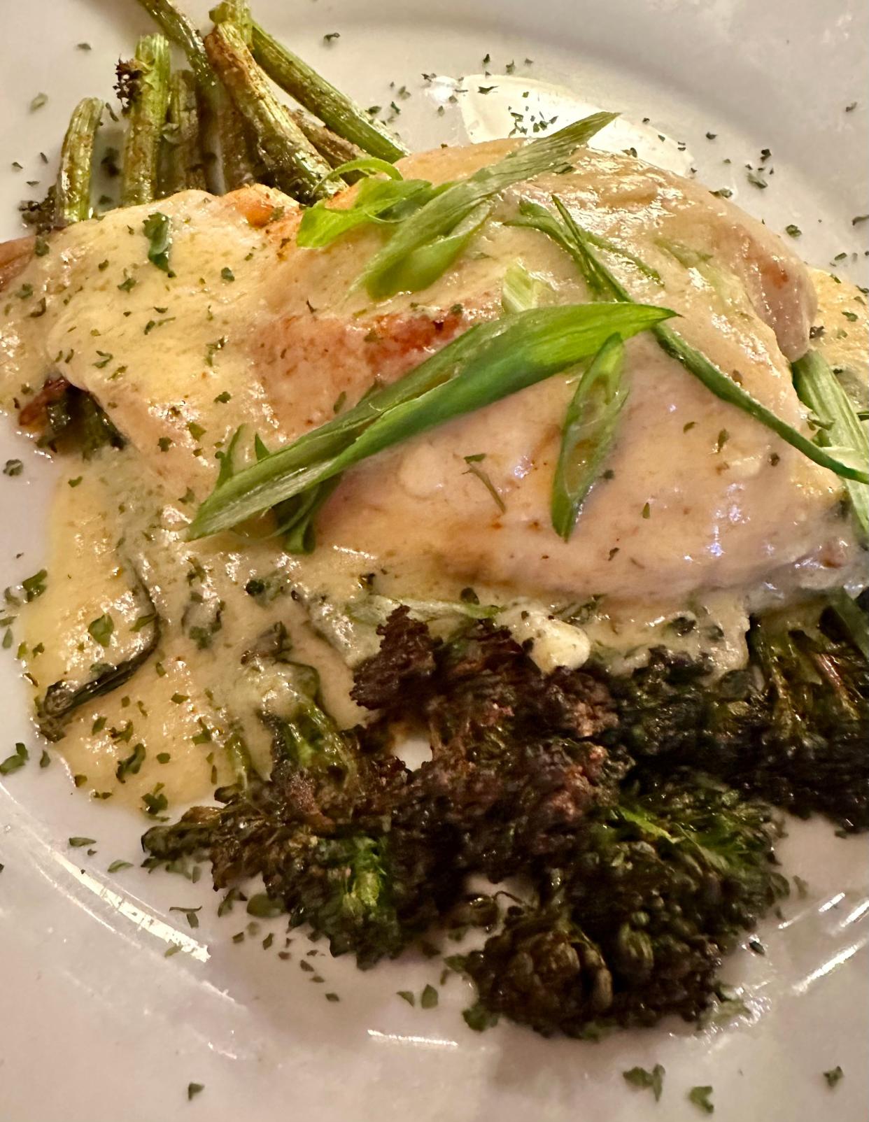 One of chef Herman's signature specials, the delicate flavors of crab stuffed flounder shine through with a tarragon béarnaise sauce and some broccolini on the side.